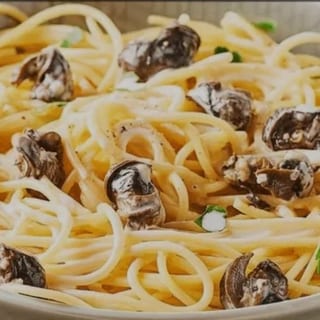 Pasta With snails Escargot